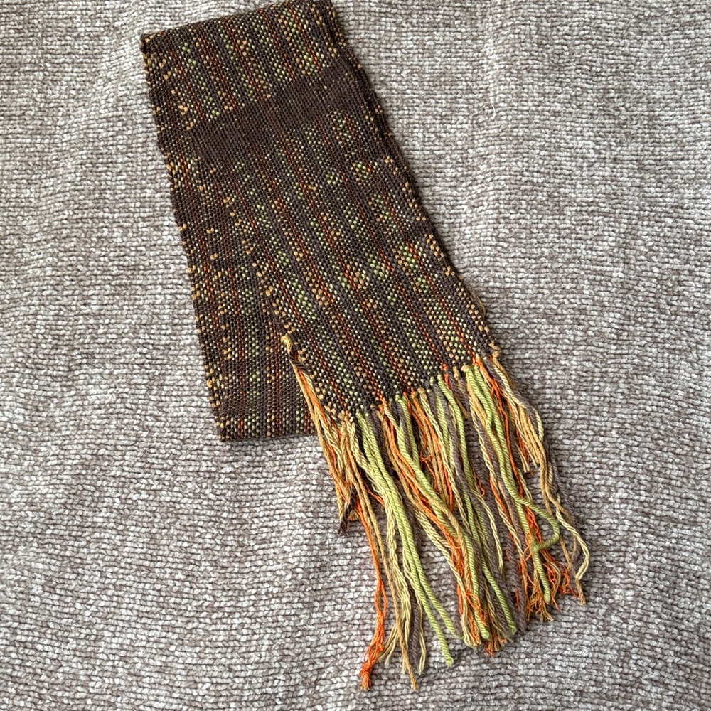 Hand-woven scarf by me! Colors include brown, orange, gold and green.